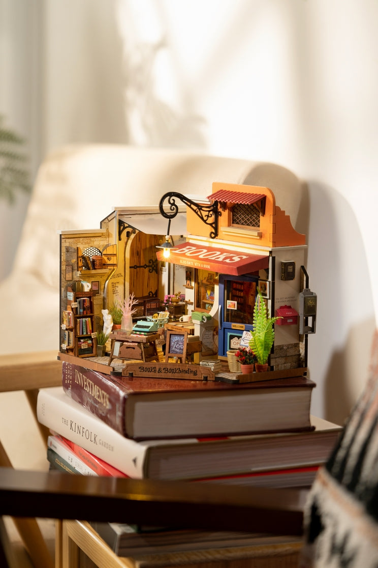 Kit de casa en miniatura para hacer tú mismo en la librería de la esquina