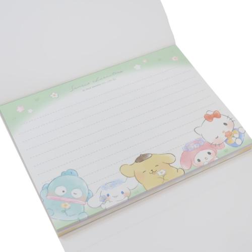 A6 notepad featuring Sanrio characters including Hello Kitty, Cinnamoroll, Keroppi, Kuromi, My Melody, Pompompurin, Pochacco, Badtz-Maru, Tuxedo Sam, Pekkle and Hangyodon!