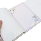 A6 notepad featuring Sanrio characters including Hello Kitty, Cinnamoroll, Keroppi, Kuromi, My Melody, Pompompurin, Pochacco, Badtz-Maru, Tuxedo Sam, Pekkle and Hangyodon!