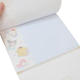 A6 notepad featuring Sanrio characters including Hello Kitty, Cinnamoroll, Keroppi, Kuromi, My Melody, Pompompurin, Pochacco, Badtz-Maru, Tuxedo Sam, Pekkle and Hangyodon!