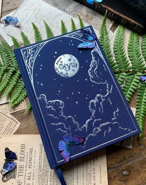 Cuaderno en blanco El Astrónomo con lámina plateada