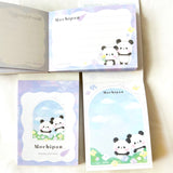 Mini bloc de notas con pandas para observar flores silvestres