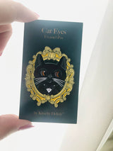 Pin de esmalte deslizante con forma de ojos de gato