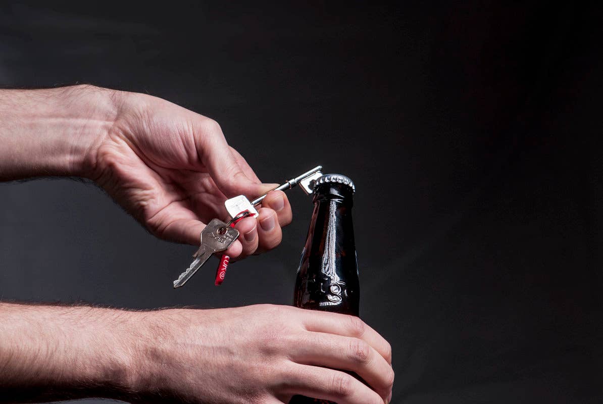 Key Bottle Opener. Unlock the good times. Stainless steel key shaped bottle opener. Attaches to your key-ring. Compact and easy to carry. An incredibly useful gift.