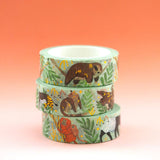 This cute washi tape features eight happy rainforest critters! Pangolin, asian elephant, three-toed sloth, golden lion tamarin, malayan tapir, clouded leopard, okapi, and tree kangaroo.